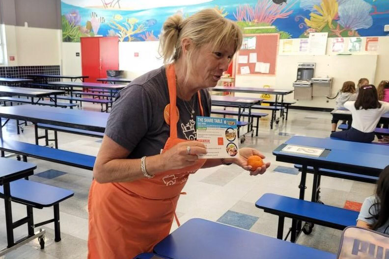 Ellen Bowen teaches students about food waste